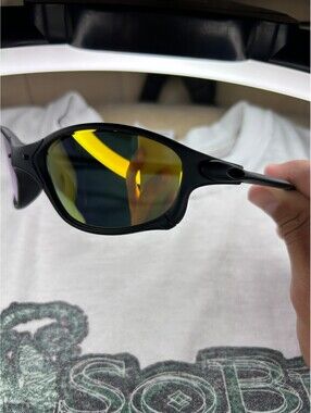 Black oval Sunglasses with Yellow Mirrored Lenses